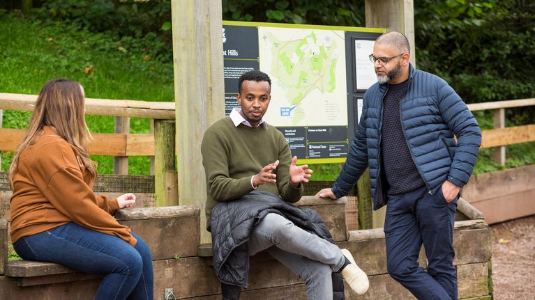 Group gathered near Clent Hills information board
